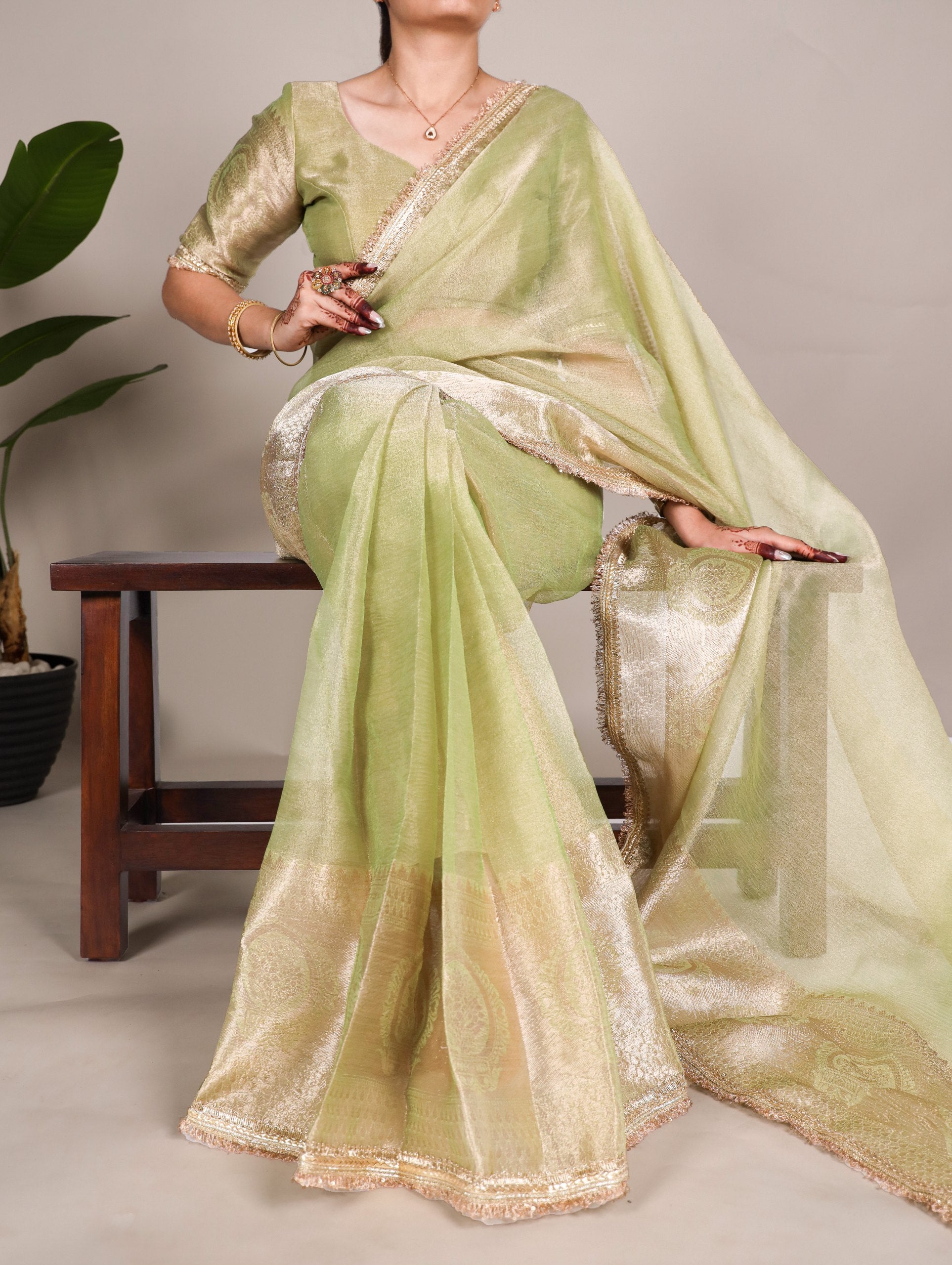 Elegant Tissue Shimmer Saree With Zari Weaving Work