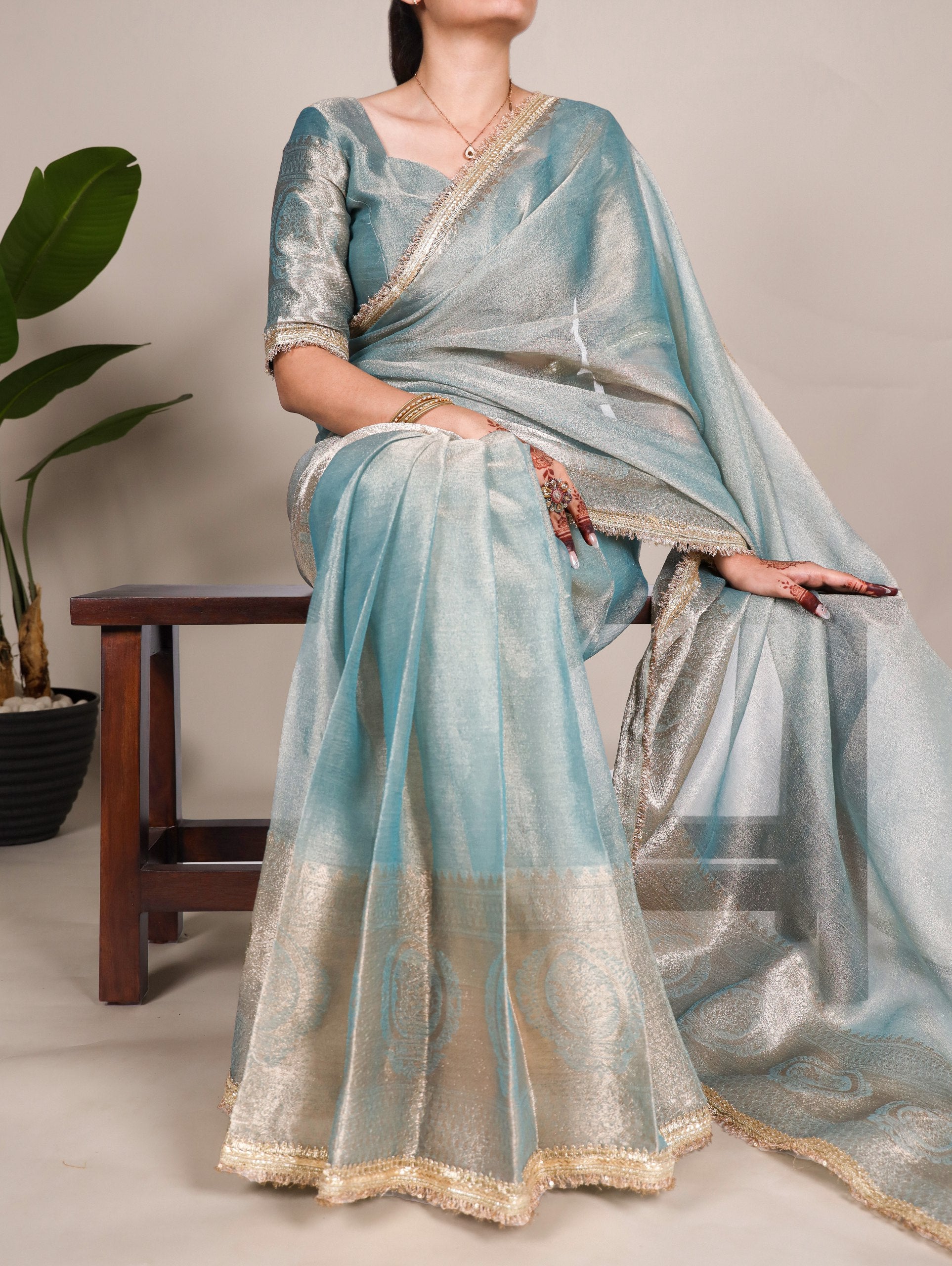 Elegant Tissue Shimmer Saree With Zari Weaving Work